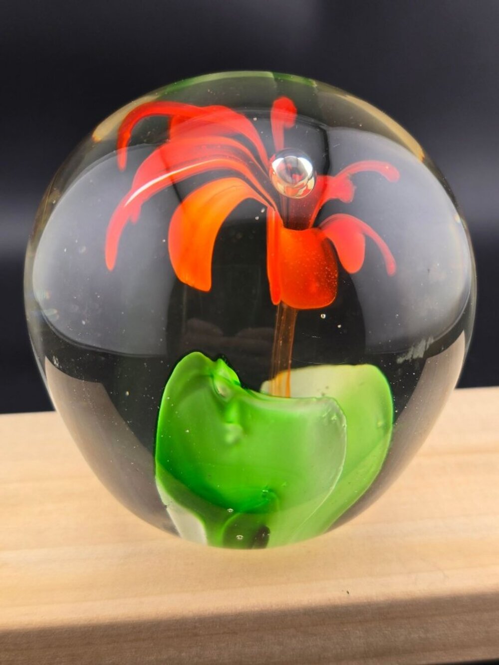 Handcrafted Clear Glass Paperweight With Orange Flower Design & Green Leaves - Picture 9 of 15